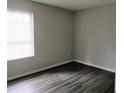 Inviting bedroom showcasing a window allowing natural light into the space at 2566 Stratford Ln, Morrow, GA 30260