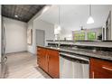 Kitchen featuring sleek stainless-steel dishwasher and dark granite countertops at , Atlanta, GA 30313