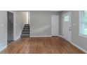Entryway with hardwood floors and stairs to the second level at 1539 Pine Glen Cir, Decatur, GA 30035