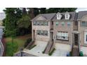 Charming brick townhome with two-car garage and well-maintained landscaping in a desirable neighborhood at 1949 Townsend Ne Ct # 22, Atlanta, GA 30329