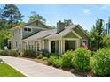Charming two-story home with a lush landscaped yard and inviting front porch at 111 Terrace Ne Dr, Atlanta, GA 30305