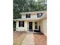 Up-close shot of the front door and Welcome sign at 1925 Sailcloth St, Lithonia, GA 30058
