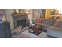 Comfortable living room with stone fireplace and cozy decor at 1638 Raleigh Cir, Marietta, GA 30067