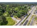 Aerial view displaying the approximate lot lines of the property's 0.70+/- acres close to surrounding roadways at 2155 Rosedale Rd, Snellville, GA 30078