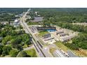 Aerial view of 2155 Rosedale Dr Snellville GA, showcasing the surrounding commercial area and lush landscape at 2155 Rosedale Rd, Snellville, GA 30078