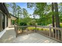 Spacious outdoor deck perfect for entertaining and enjoying the serene surroundings at 117 Franklin Rd, Woodstock, GA 30188