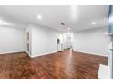 Bright living room features hardwood floors, neutral paint and ample space at 3575 Oakvale Rd # 301, Decatur, GA 30034