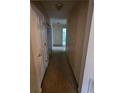 Neutral hallway offering a glimpse into the home's layout at 3502 Tiffany Se Dr, Conyers, GA 30013