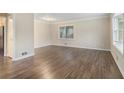 Spacious living room with hardwood floors and bright windows at 2083 Green Forrest Dr, Decatur, GA 30032