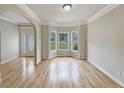 Bright living room featuring hardwood floors and a bay window at 3517 Mortons Landing Dr, Ellenwood, GA 30294