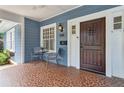 Inviting front porch with stylish tile flooring and a charming front door at 588 Angier Ne Ave, Atlanta, GA 30308