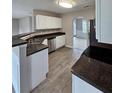 Well-equipped kitchen with stainless steel appliances and granite countertops at 165 Heaton Place Trl, Covington, GA 30016