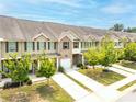 A view of the home's exterior showcasing lush landscaping and well-maintained grounds at 1931 Old Dogwood, Jonesboro, GA 30238