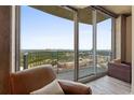 Breathtaking balcony view overlooking lush greenery and the city skyline at 361 17Th St # 2120, Atlanta, GA 30363