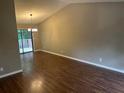 Bright dining area with hardwood flooring, neutral walls and sliding door access to the deck at 3674 Riverchase Ter, Decatur, GA 30034