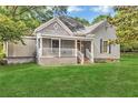 Inviting one-story home with a covered front porch, perfect for relaxing outdoors at 3961 Jodeco Rd, Mcdonough, GA 30253