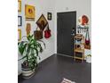 Inviting entryway featuring a black front door, modern decor, and stylish accents at 195 Arizona Ne Ave # 197, Atlanta, GA 30307