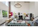 An airy open-concept living space with exposed brick and plenty of natural light at 195 Arizona Ne Ave # 197, Atlanta, GA 30307