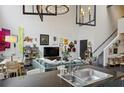 Stylish living room with a modern kitchen featuring sleek countertops and stainless steel appliances at 195 Arizona Ne Ave # 197, Atlanta, GA 30307
