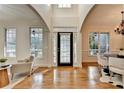 Bright and airy foyer with hardwood floors and high ceilings at 306 Mill Rdg, Canton, GA 30114