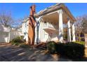 Classic two-story home featuring prominent columns and a brick chimney at 1242 Star Ne Dr, Brookhaven, GA 30319