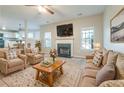 Inviting living room with cozy seating, fireplace, and large windows at 2931 Two Lake Cir, Atlanta, GA 30349