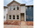 New townhome construction featuring a mix of brick and siding, highlighting modern design at 4428 Ryan St, Douglasville, GA 30135