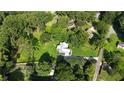 Aerial view of a home surrounded by lush greenery, showcasing the expansive yard at 48 Old Canton Ne Rd, Cartersville, GA 30121