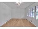 Inviting living room filled with natural light and features sleek floors and modern light fixture at 6243 David Sw Ln, Mableton, GA 30126