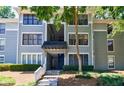 Attractive three-story condo building, showcasing curb appeal and a well-maintained facade at 215 Summit North Ne Dr, Atlanta, GA 30324