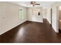 Bright living room featuring hardwood floors, neutral colors, and lots of natural light at 690 Horsley Mill Rd, Carrollton, GA 30116