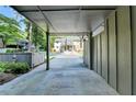 Spacious carport offering covered parking and views of the surrounding neighborhood at 882 Cedar Canyon Se Sq, Marietta, GA 30067