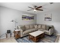Inviting living room with stylish decor and a comfortable sectional sofa at 1500 Pine Log #D Ne Rd, Conyers, GA 30012