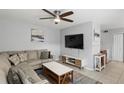 Contemporary living room with a large screen TV and stylish furnishings at 1500 Pine Log #D Ne Rd, Conyers, GA 30012
