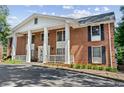 Striking brick apartment building showcasing architectural symmetry at 135 E Hill St # 22, Decatur, GA 30030