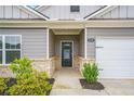 Close-up of the front door showcasing the brickwork and stylish entry to the home at 225 Limestone Cir, Conyers, GA 30013