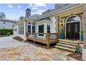 Charming home featuring a stone driveway, portico entrance, and attached garage at 511 Pine Valley Se Rd, Marietta, GA 30067