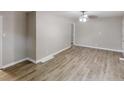 Bright and airy living room boasts modern flooring and a neutral color palette at 568 Mcwilliams Se Rd, Atlanta, GA 30315