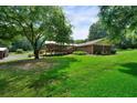 Expansive backyard features a covered deck perfect for outdoor entertaining at 81 Laurie Ct, Hiram, GA 30141