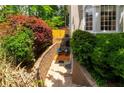 Backyard with a cozy seating area and a landscaped retaining wall at 3655 Brisbane Dr, Marietta, GA 30062