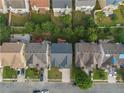 Aerial view of a neighborhood showcasing the home's location among other residential properties at 3460 Drayton Manor Run, Lawrenceville, GA 30046