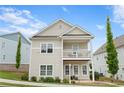 Charming two-story home with a welcoming front porch and second story balcony at 230 Fender Walk, Marietta, GA 30060