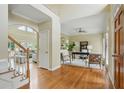 Spacious home foyer with hardwood flooring leading to an office and living area at 2802 Arabian Ne Trl, Marietta, GA 30062