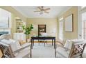 Cozy home office featuring natural light, built-in shelving, and hardwood floors at 2802 Arabian Ne Trl, Marietta, GA 30062