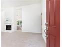 Bright living room features a stone fireplace, neutral carpet, and inviting open layout at 2753 Fireside Se Ct, Marietta, GA 30067