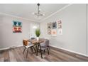 Cozy dining area with stylish lighting fixture and modern decor, great for Gathering meals at 3162 Alston Drive Dr, Decatur, GA 30032
