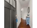Inviting entryway with hardwood floors, console table, and stylish decor at 61 N Auburn Landing Pl, Auburn, GA 30011