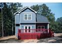 A spacious backyard with a large deck perfect for outdoor entertaining, offering seamless indoor-outdoor living at 102 Neal Ave, Stockbridge, GA 30281