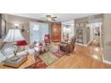 Cozy living room features hardwood floors, French doors, and a ceiling fan at 1705 Brighton Pt, Atlanta, GA 30328
