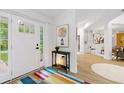 Beautiful foyer with lots of natural light and modern decor shows the bright open floor plan of the house at 2349 Echo Cliff Ne Ct, Atlanta, GA 30345